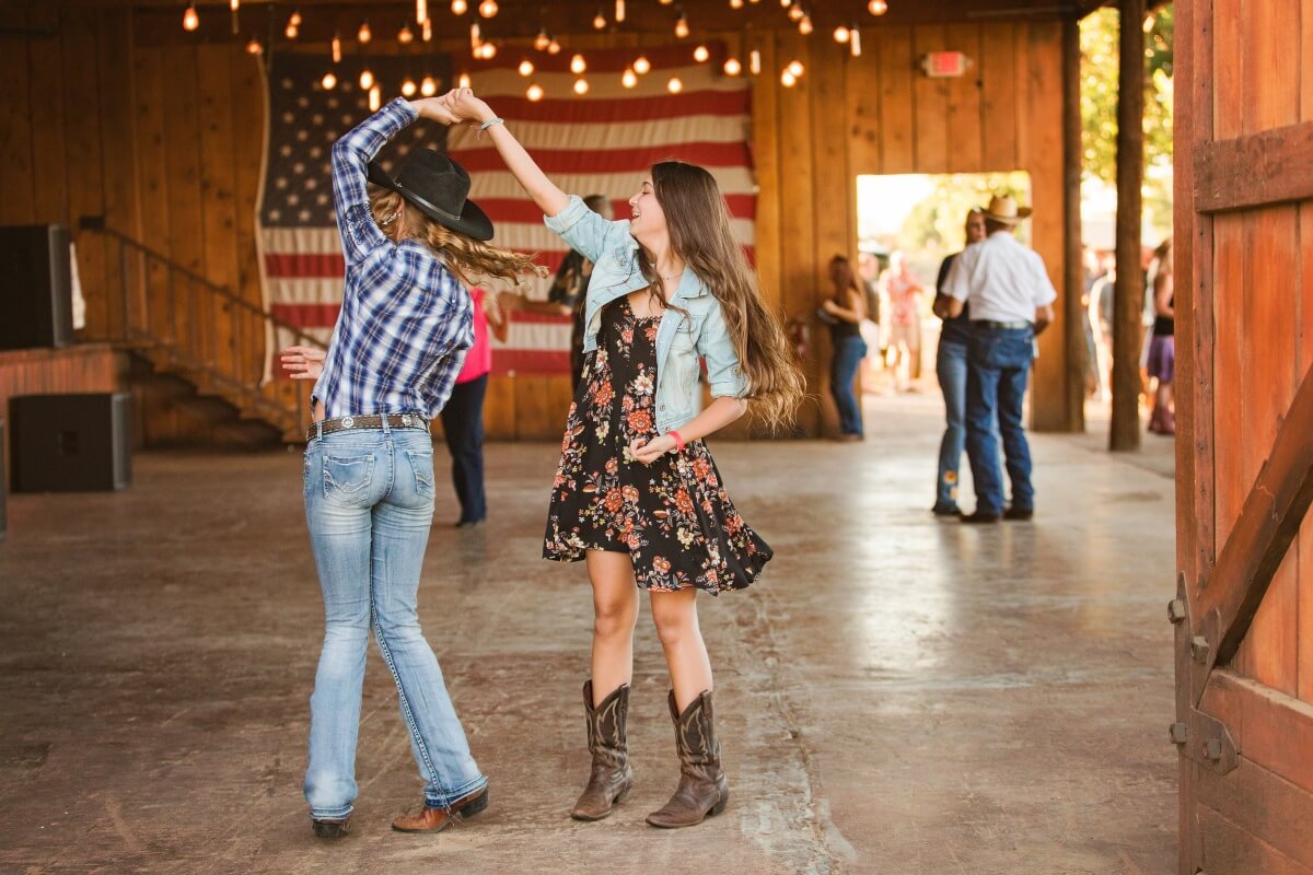 Our Friday Night Barn Dance is full of delicious farm-to-table food, live music, and fun line dancing!